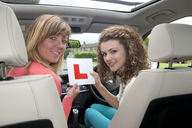 driving-lessons-with-a-female-instructor-adobestock-51037113-1-1024x680